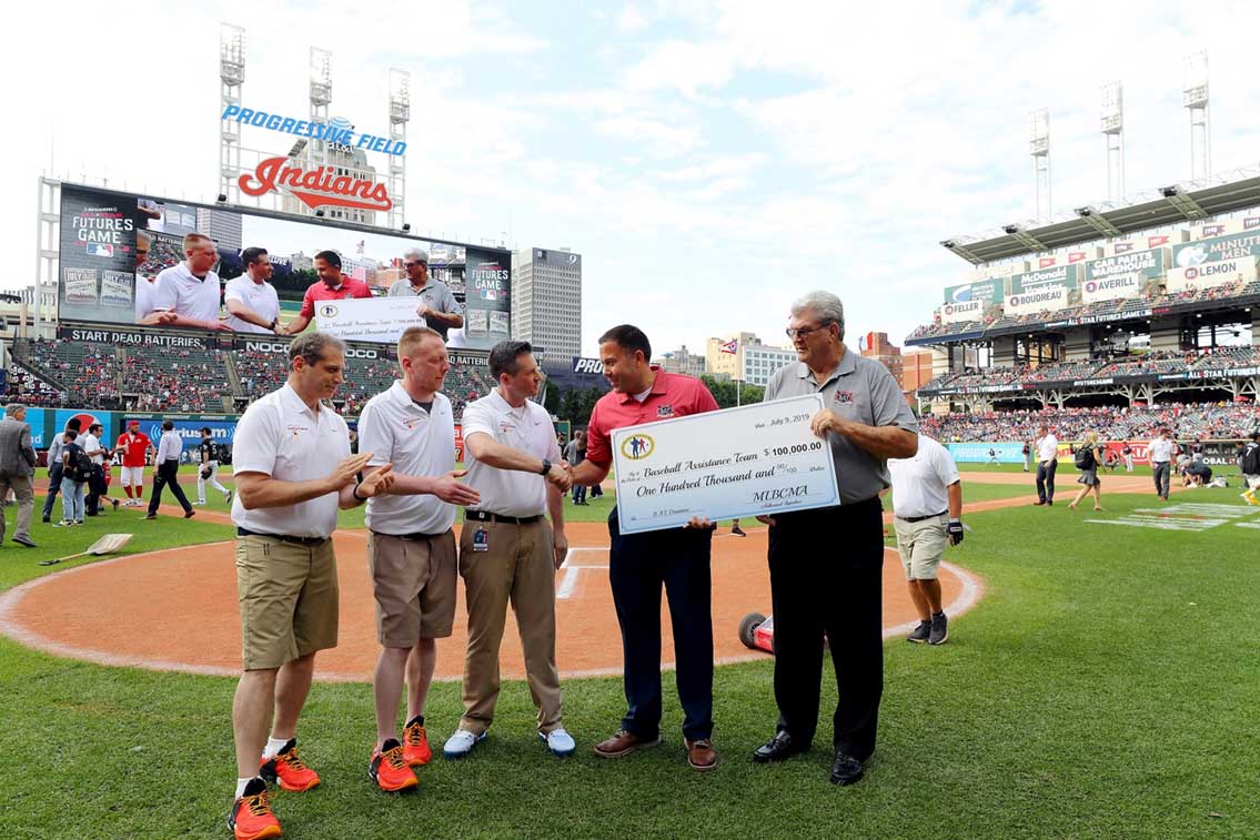 Represented by MLBCMA President Lou Cucuzza, Jr. and Clubhouse Managers Tony Amato and Willie Jenks of the host Cleveland Indians, the check was presented to Eric Nilson, Executive Director and Sam McDowell of B.A.T. prior to the MLB All-Star Futures Game in Cleveland, OH.